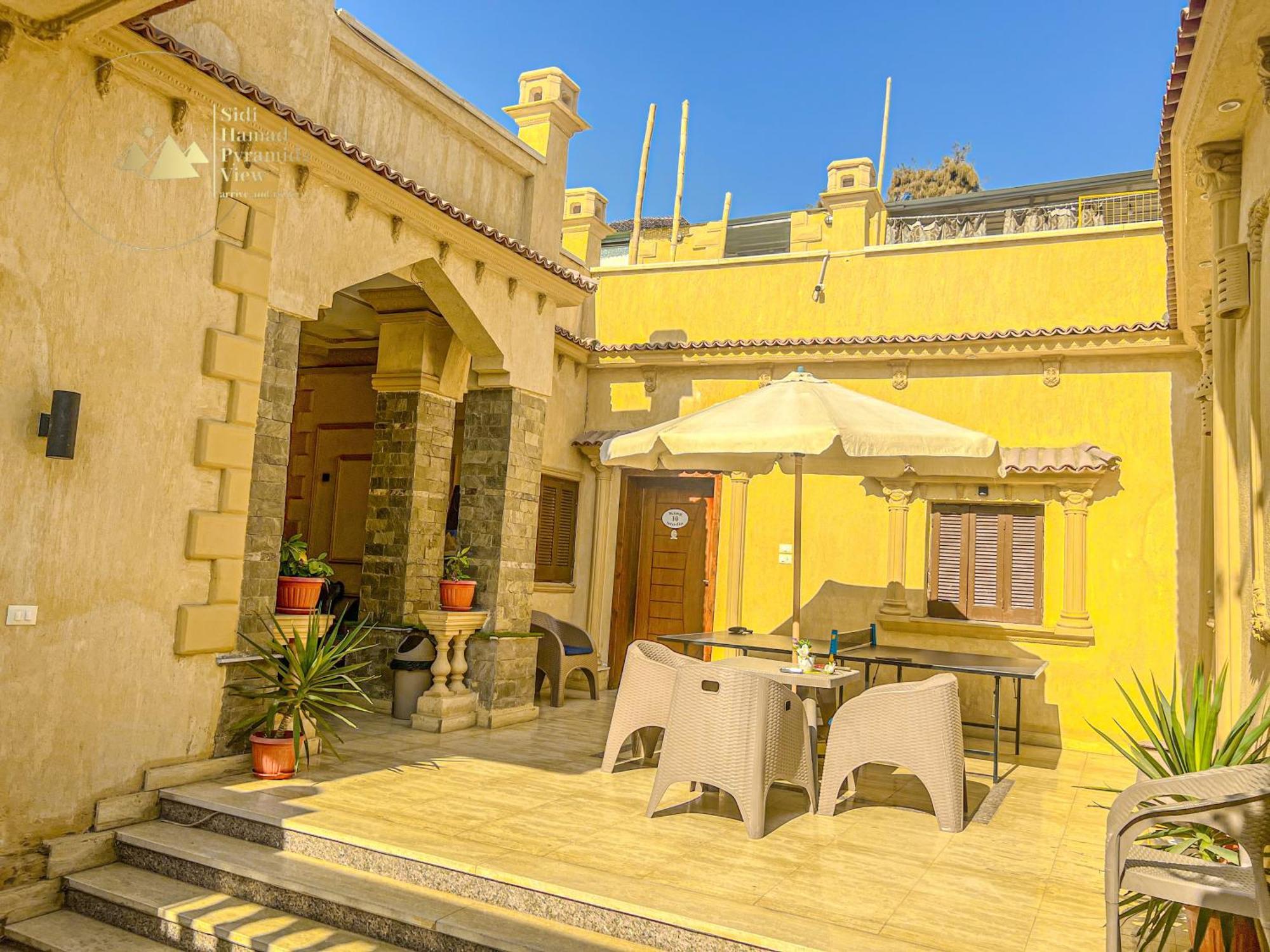 Sidi Hamad Pyramids View Hotel Kafrat al Jabal Bagian luar foto