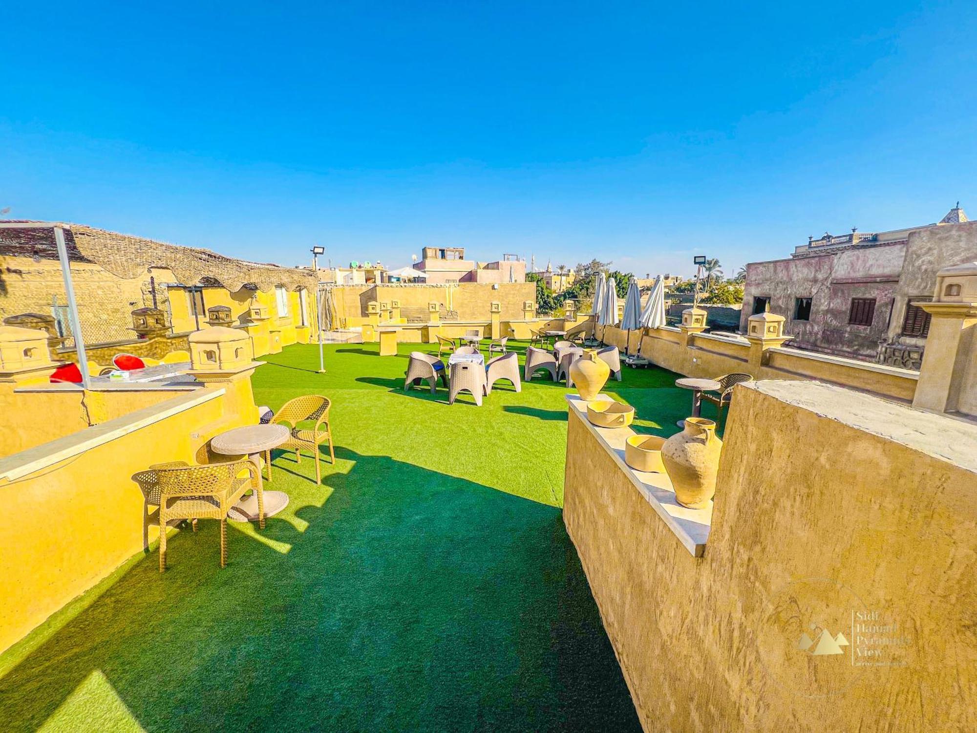 Sidi Hamad Pyramids View Hotel Kafrat al Jabal Bagian luar foto