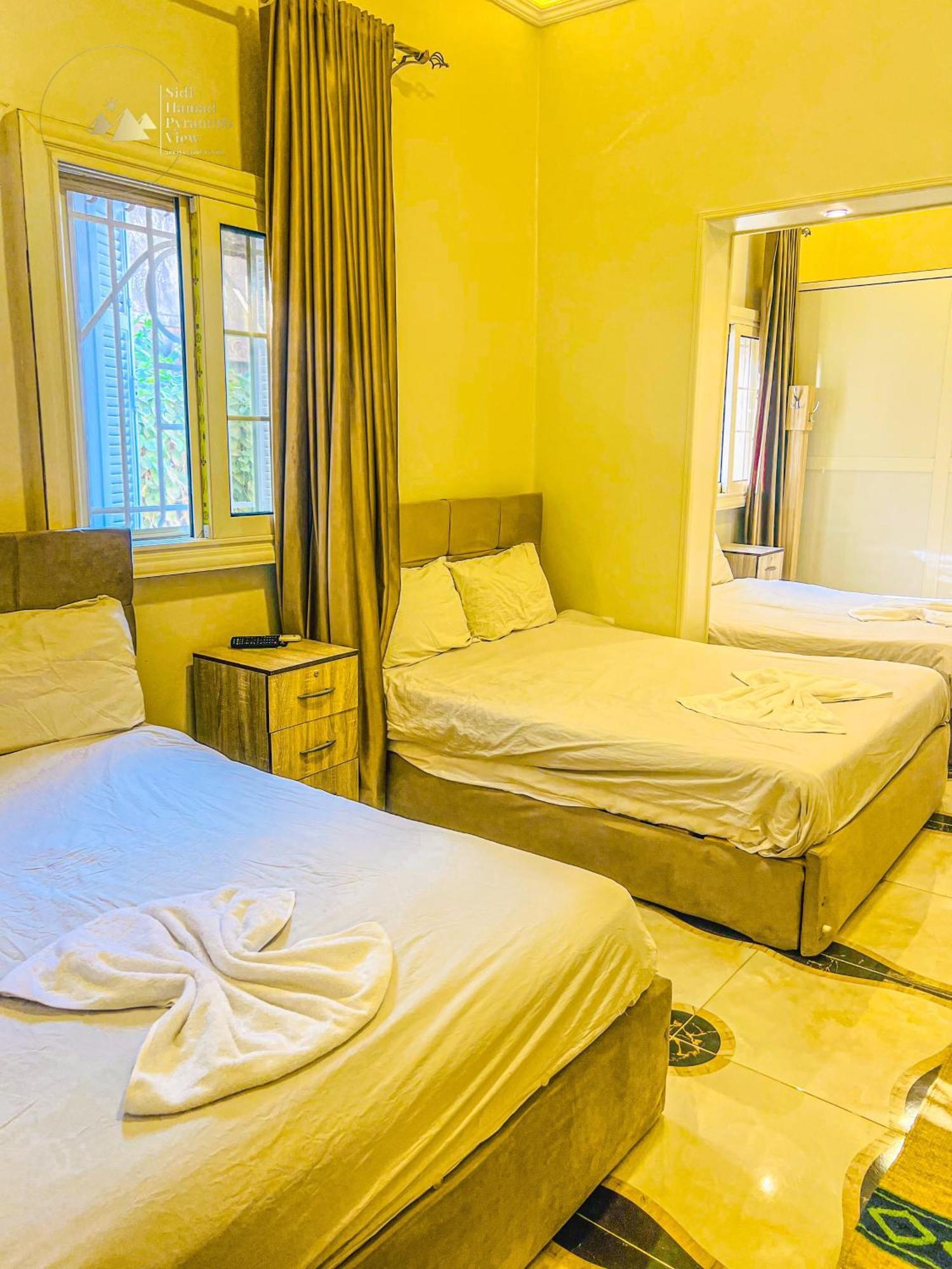 Sidi Hamad Pyramids View Hotel Kafrat al Jabal Bagian luar foto