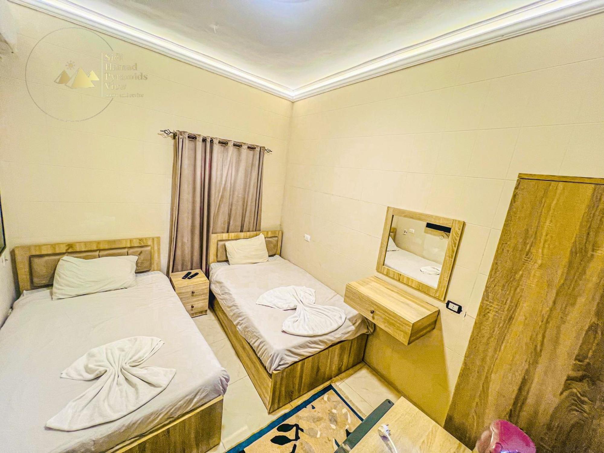 Sidi Hamad Pyramids View Hotel Kafrat al Jabal Bagian luar foto