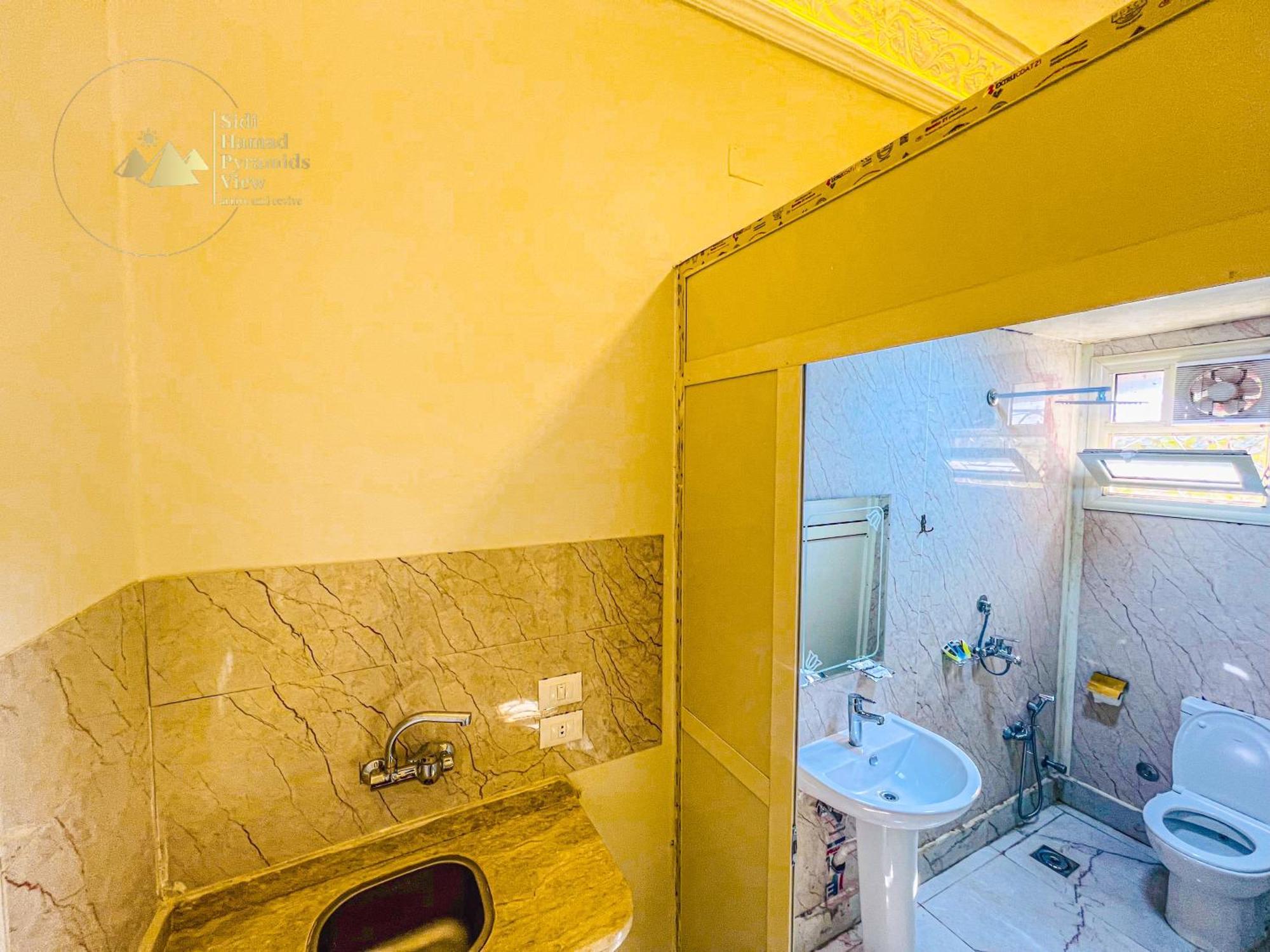 Sidi Hamad Pyramids View Hotel Kafrat al Jabal Bagian luar foto