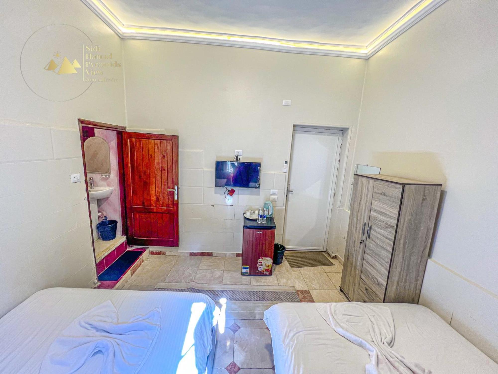 Sidi Hamad Pyramids View Hotel Kafrat al Jabal Bagian luar foto