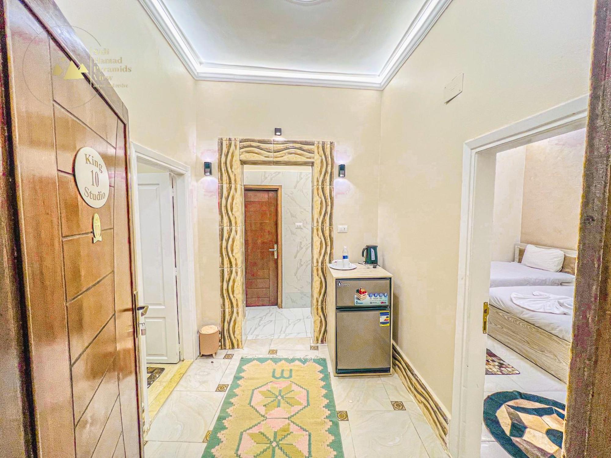 Sidi Hamad Pyramids View Hotel Kafrat al Jabal Bagian luar foto