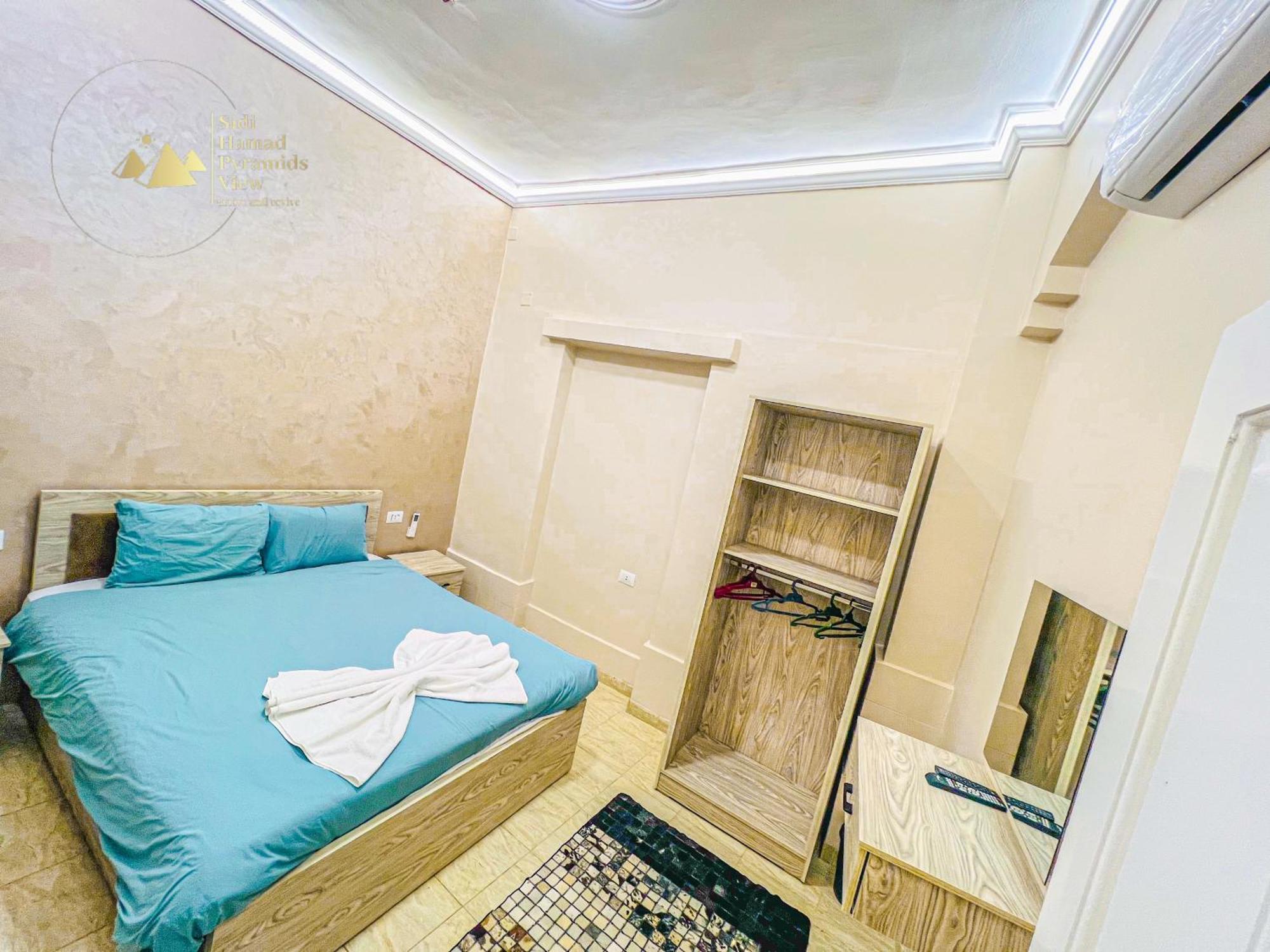 Sidi Hamad Pyramids View Hotel Kafrat al Jabal Bagian luar foto